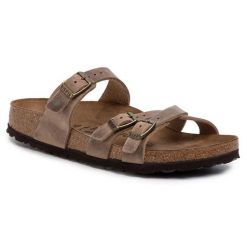 Klapki Birkenstock. Brązowe klapki Birkenstock, bez wzorów, bez obcasa, bez zapięcia. Za 499.99 zł.