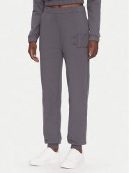 Calvin Klein Jeans Spodnie dresowe J20J225355 Szary Regular Fit. Szare spodnie dresowe Calvin Klein Jeans, bez wzorów, z bawełny. Za 249.99 zł.