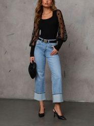 Milan Kiss Bluzka w kolorze czarnym rozmiar: M. Czarne bluzki Milan Kiss, m, bez wzorów, prążkowane, bez kołnierzyka, bez ramiączek. Za 204.96 zł.