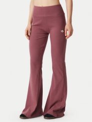 Adidas Legginsy Essentials KT4760 Różowy ciemny Flared Leg. Czerwone legginsy adidas, bez wzorów, z wiskozy. Za 219.99 zł.