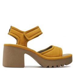 Sandały Fly London. Żółte sandały Fly London, bez wzorów, bez obcasa, na słupku, bez zapięcia. Za 749.99 zł.