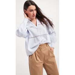 Koszula TWINSET. Niebieskie koszule Twinset Milano, bez wzorów, z koronki, bez kołnierzyka, bez ramiączek. W wyprzedaży za 533.40 zł.