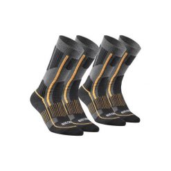 Skarpety turystyczne SH520 X-WARM MID. Szare skarpetki QUECHUA, bez wzorów, z elastanu. Za 59.99 zł.