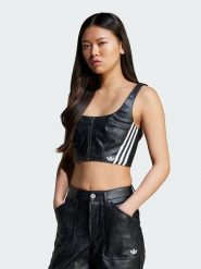 Adidas Top "Originals Adilenium Season 3" w kolorze czarnym ze skóry syntetycznej rozmiar: 38. Czarne topy adidas, bez wzorów, ze skóry, bez kołnierzyka, bez ramiączek. Za 110.45 zł.