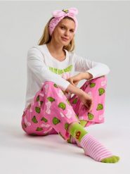 Bawełniana piżama dwuczęściowa Grinch - kremowy. Białe piżamy Sinsay, l, bez wzorów, z bawełny, bez kołnierzyka, bez ramiączek. Za 55.99 zł.
