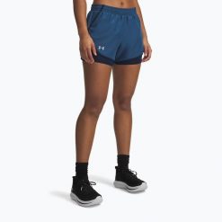 Spodenki do biegania damskie Under Armour Fly By 2IN1. Niebieskie szorty Under Armour, bez wzorów, sportowe. Za 169.99 zł.
