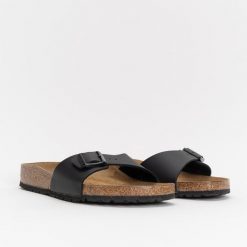 Birkenstock Madrid BS Klapki damskie. Czarne klapki Birkenstock, bez wzorów, młodzieżowe, bez obcasa, bez zapięcia. Za 319.99 zł.