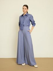 BGN Spodnie w kolorze niebieskim rozmiar: 38. Niebieskie spodnie materiałowe BGN, bez wzorów, z materiału. Za 121.99 zł.