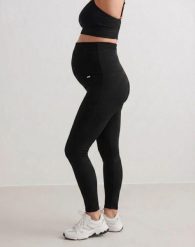 Damskie legginsy ciążowe prążkowane, bezszwowe Ribbed Seamless czarne. Czarne legginsy AIM'N, bez wzorów, z dzianiny, długie. Za 258.00 zł.