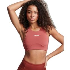 Biustonosz dla kobiet Superdry Active Core. Brązowe biustonosze sportowe Superdry, bez wzorów, na fitness i siłownię. W wyprzedaży za 132.60 zł.