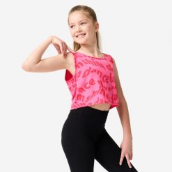 Top do tańca modern jazz dla dzieci. Czerwone topy DOMYOS, bez wzorów, z elastanu, sportowe, bez kołnierzyka, bez ramiączek. Za 39.99 zł.