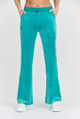 JUICY COUTURE Damskie turkusowe spodnie desowe Layla Jewelled Low Rise Pant. Niebieskie spodnie dresowe Juicy Couture, bez wzorów, z dresówki. W wyprzedaży za 364.99 zł.