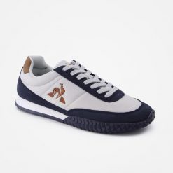 Buty sportowe damskie Veloce Ripstop ombre blue. Niebieskie buty treningowe Le Coq Sportif, bez wzorów, bez zapięcia. W wyprzedaży za 338.30 zł.