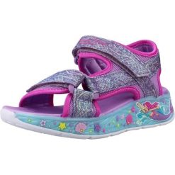 Sandały SKECHERS LIGHTS MERMAID DR Fioletowy. Fioletowe sandały Skechers, bez wzorów, z materiału, bez obcasa, bez zapięcia. Za 290.00 zł.