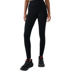 Legginsy damskie 4F FNK. Czarne legginsy 4f, bez wzorów, z materiału, długie. Za 92.99 zł.