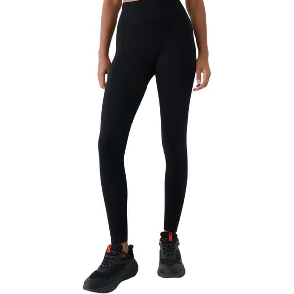 Legginsy damskie 4F FNK. Czarne legginsy 4f, bez wzorów, z materiału, długie. Za 92.99 zł.