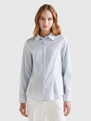 Benetton Koszula w kolorze błękitnym rozmiar: L. Niebieskie koszule Benetton, l, bez wzorów, bez kołnierzyka, bez ramiączek. Za 57.06 zł.