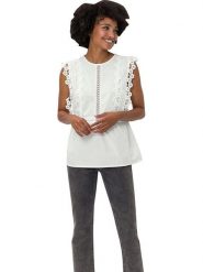 Heine Bluzka w kolorze kremowym rozmiar: 46. Brązowe bluzki Heine, bez wzorów, z koronki, bez kołnierzyka, bez ramiączek. Za 87.19 zł.