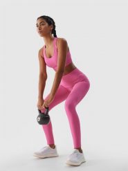 4F Legginsy treningowe bezszwowe damskie - różowe M/L. Czerwone legginsy 4f, bez wzorów, z dzianiny, klasyczne, długie. W wyprzedaży za 59.99 zł.