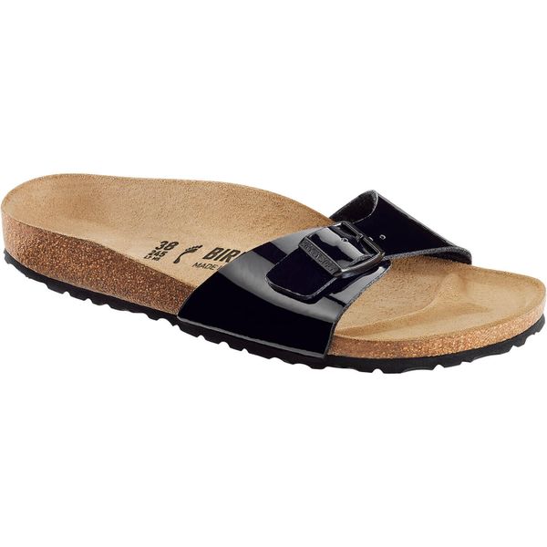 Klapki damskie Birkenstock 040303. Czarne klapki Birkenstock, bez wzorów, z materiału, młodzieżowe, bez obcasa, bez zapięcia. Za 440.05 zł.