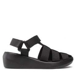 Sandały Fly London. Czarne sandały Fly London, bez wzorów, bez obcasa, na koturnie, bez zapięcia. Za 279.99 zł.