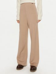 Calvin Klein Spodnie dresowe K20K207680 Beżowy Relaxed Fit. Brązowe spodnie dresowe Calvin Klein, bez wzorów, z dresówki. Za 699.99 zł.