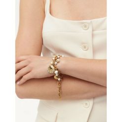 Bransoletka Guess. Żółte bransoletki Guess, złote. Za 379.99 zł.
