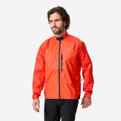 Kurtka przeciwdeszczowa rowerowa MTB Rockrider Comfort 500. Czerwone kurtki ROCKRIDER, l, bez wzorów, z materiału, bez kaptura, rowerowe. Za 159.99 zł.