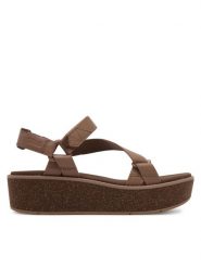 Teva Sandały Madera Wedge 1151015 Brązowy. Brązowe sandały Teva, bez wzorów, z materiału, bez obcasa, na koturnie, bez zapięcia. Za 519.99 zł.