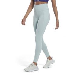 Damskie legginsy z wysokim stanem Reebok Lux. Niebieskie legginsy Reebok, bez wzorów, sportowe. W wyprzedaży za 217.30 zł.