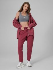 4F Spodnie dresowe damskie - burgundowe XXL. Czerwone spodnie sportowe 4f, bez wzorów, z bawełny. Za 139.99 zł.