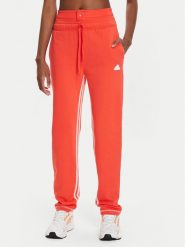 Adidas Spodnie dresowe Dance All-Gender Versatile IS0897 Pomarańczowy Regular Fit. Brązowe spodnie dresowe adidas, bez wzorów, z bawełny. Za 299.99 zł.