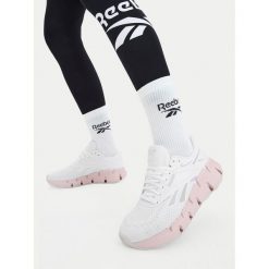 Buty do biegania Reebok. Białe buty treningowe Reebok, bez wzorów, bez zapięcia, do biegania. Za 369.99 zł.