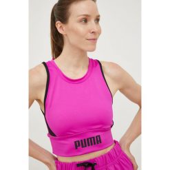 Puma top treningowy kolor różowy. Czerwone topy Puma, l, bez wzorów, ze skóry, bez kołnierzyka, bez ramiączek. Za 139.99 zł.