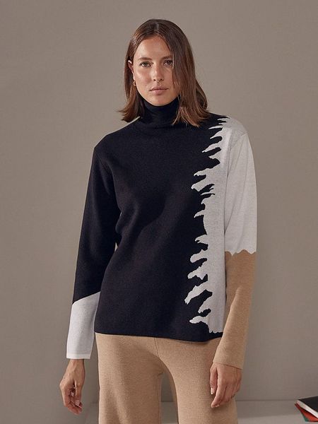 Rodier Golf w kolorze czarno-beżowo-białym rozmiar: L. Białe swetry Rodier, l, bez wzorów, ze splotem, klasyczne, bez ramiączek. Za 236.61 zł.