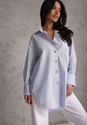 Niebieska Oversizowa Koszula z Bawełny z Eleganckimi Guzikami Rhenenore. Niebieskie koszule Renee, l, bez wzorów, z bawełny, casualowe, bez kołnierzyka, bez ramiączek. Za 169.99 zł.