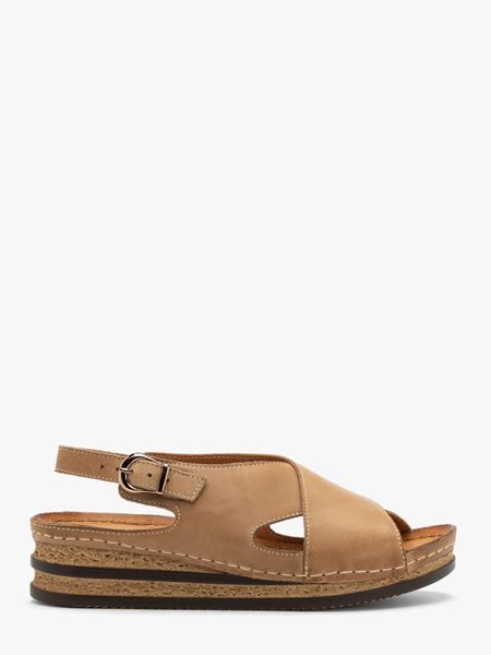 Beżowe sandały na platformie. Brązowe sandały Ryłko, bez wzorów, ze skóry, bez obcasa, na platformie, bez zapięcia. W wyprzedaży za 279.99 zł.