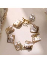 Atelier MIU Pozłacana bransoletka z perłami rozmiar: onesize. Brązowe bransoletki atelier MIU, z perłą, pozłacane. Za 43.99 zł.