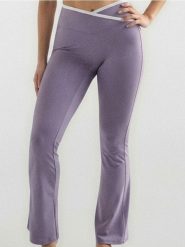 Legginsy flare z kontrastową lamówką - fioletowy. Fioletowe legginsy sportowe Sinsay, l, bez wzorów. Za 49.99 zł.