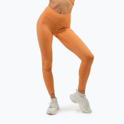 Legginsy NEBBIA Discipline. Brązowe legginsy Nebbia, bez wzorów, sportowe. Za 209.99 zł.