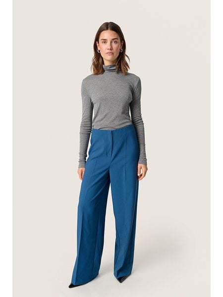 Soaked in Luxury Spodnie w kolorze niebieskim rozmiar: S. Niebieskie spodnie materiałowe Soaked in Luxury, bez wzorów, z materiału, z podwyższonym stanem. Za 144.92 zł.