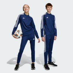 Tiro 23 Club Training Pants. Białe spodnie dresowe adidas, bez wzorów, z dresówki, na fitness i siłownię. Za 110.99 zł.