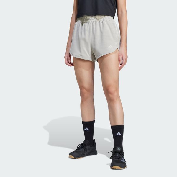 Szorty Pacer Training 3-Stripes Woven High-Rise. Brązowe szorty sportowe adidas, bez wzorów, z materiału, na fitness i siłownię. Za 149.00 zł.