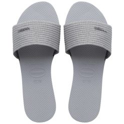 Klapki Havaianas Model 4147312 Kolor Szary. Szare klapki Havaianas, bez wzorów, sportowe, bez obcasa, bez zapięcia. Za 179.99 zł.