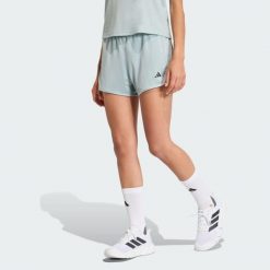Szorty Pacer Essentials Knit High-Rise. Białe szorty sportowe adidas, bez wzorów, z materiału, na fitness i siłownię. Za 129.00 zł.
