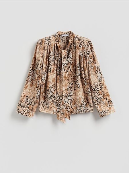 Bluzka w zwierzęcy wzór - wielobarwny. Bluzki Reserved, l, bez wzorów, z tkaniny, bez kołnierzyka, bez ramiączek. Za 179.99 zł.