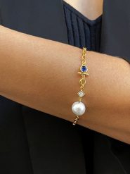 DI GIORGIO Pozłacana bransoletka z cyrkoniami i perłą rozmiar: onesize. Białe bransoletki DI GIORGIO, z cyrkonią, pozłacane. Za 150.95 zł.