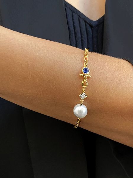 DI GIORGIO Pozłacana bransoletka z cyrkoniami i perłą rozmiar: onesize. Białe bransoletki DI GIORGIO, z cyrkonią, pozłacane. Za 150.95 zł.