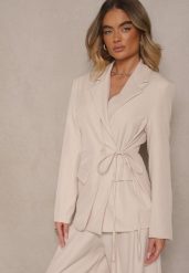 Jasnobeżowa Marynarka Ozdobiona Wiązaniem z Boku Lunorisa. Brązowe marynarki i żakiety Renee, l, bez wzorów, eleganckie, bez ramiączek. W wyprzedaży za 107.99 zł.