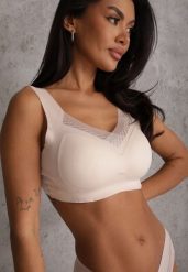 Beżowy Sportowy Biustonosz z Usztywnieniem Ozdobiony Siateczkową Wstawką Edalissa. Brązowe biustonosze sportowe Renee, bez wzorów, na jogę i pilates. Za 24.99 zł.